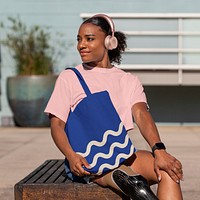 Woman enjoying music, happy African American amputee person