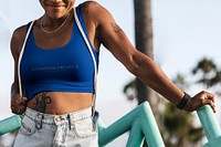 Blue tank top outfit, woman at the Venice beach, kindness project text
