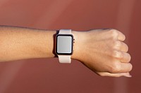 Hand wearing a smartwatch, blank touchscreen