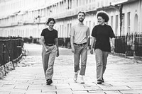 Three friends strolling in the city 