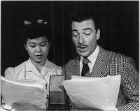 Three Thirds of a Nation. Barbara Jane Wong, American-born Chinese actress, shares mike with film star Walter Pidgeon for the War Production Board (WPB) radio program "Wool". Sourced from the Library of Congress.