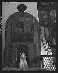 Trampas, New Mexico. The side altar to the left of the nave of a church which was built in 1700, and is the best-preserved colonial mission in the Southwest. Sourced from the Library of Congress.