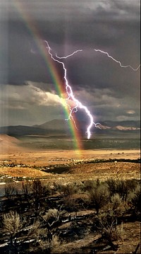 Lightning, Wildfire, and Rainbows all came together in the Jacks Valley, Jacks Fire-Humboldt-Toiyabe National Forest in Nevada. Forest Service photo by Hillary Williams. Original public domain image from Flickr