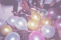 Colorful party balloons on floor, aesthetic design