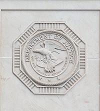                         The John A. Campbell U.S. Courthouse in Mobile, Alabama is a white, limestone building resting on a granite base, built in the relatively austere Neo-Classical Revival style                        