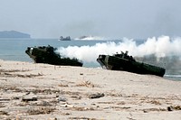 U.S. Marines with India Company, 3rd Battalion, 5th Marine Regiment, 31st Marine Expeditionary Unit and Philippine marines arrive at a beach during a mechanized assault as part of Amphibious Landing Exercise (PHIBLEX) 15 in Zambales, Luzon, Philippines, Oct. 5, 2014.