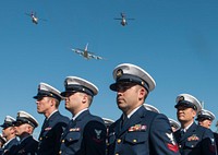 U.S. Coast Guard Petty Officer 2nd Class Robert Ouellette, foreground, with the engineering department at Coast Guard Sector St. Petersburg, stands with other Coast Guardsmen as aircraft assigned to Coast Guard Air Station Clearwater participate in the 34th anniversary memorial service of the collision of the seagoing buoy tender USCGC Blackthorn (WLB 391) Jan. 28, 2014, at Blackthorn Memorial Park in St. Petersburg, Fla. The Blackthorn sank after colliding with a tanker near the Sunshine Skyway Bridge Jan. 28, 1980.