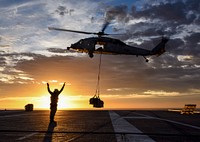 170107-N-BL637-082PACIFIC OCEAN (Jan. 7, 2017) The aircraft carrier USS Carl Vinson (CVN 70) conducts a vertical replenishment-at-sea with the fleet replenishment oiler USNS Yukon (T-AO 202).