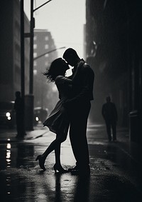 A couple dancing in the rain in the city on the road motion street adult. AI generated Image by rawpixel.