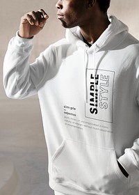 Printed white hoodie in simple style men’s apparel fashion shoot