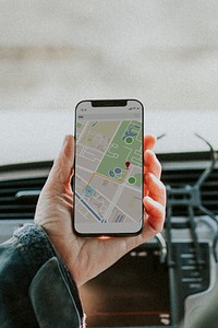 Senior tourist man holding her smartphone with GPS app