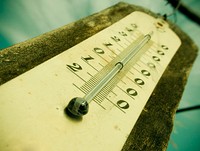 Close up of a wooden thermometer