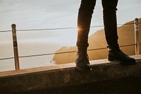 Man standing on a bridge