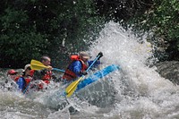 Rafting operators share the whitewater experience with visitors on the Wild and Scenic Tuolumne River on the Stanislaus National Forest. Original public domain image from Flickr