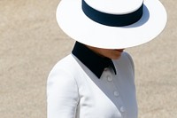 The President and First Lady in the U.K. First Lady Melania Trump walks across the lawn of Buckingham Palace Monday, June 3, 2019, prior to attending a welcome ceremony in London. (Official White House Photo by Andrea Hanks). Original public domain image from Flickr