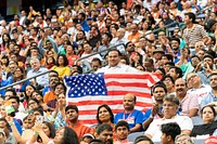 Howdy, Modi! Audience members in a crowd of more than 50,000 people hold up flags and banners as they cheer President Donald J. Trump and India’s Prime Minister Narendra Modi on Sunday, Sept. 22, 2019, at a rally in honor of Prime Minister Modi at NRG Stadium in Houston, Texas. (Official White House Photo by Shealah Craighead). Original public domain image from Flickr