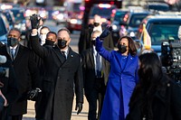 Vice President Kamala Harris and her husband Mr. Doug Emhoff wave during the inaugural parade Wednesday, Jan. 20, 2021, as they walk down Pennsylvania Ave. toward the Eisenhower Executive Office Building at the White House.
