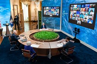 President Joe Biden, joined by Special Envoy for Climate John Kerry, Secretary of the Treasury Janet Yellen and Director of the National Economic Council Brian Deese, attends the Leaders Summit on Climate Thursday, April 22, 2021, in the East Room of the White House.