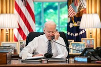 President Joe Biden speaks on the phone with Israeli Prime Minister Benjamin Netanyahu on Wednesday, May 12, 2021, in the Oval Office of the White House. (Official White House Photo by Adam Schultz). Original public domain image from Flickr