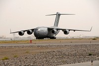 Afghanistan AEF 2012.A C-17 Globemaster III from Joint Base Lewis-McChord taxis on the runway at Kandahar Airfield, Afghanistan on July 5, 2012. (U.S. Air Force photo/TSgt. Stephen Hudson). Original public domain image from Flickr