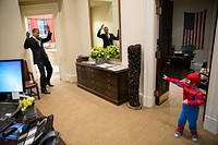 Oct. 26, 2012: "The President pretends to be caught in Spider-Man's web as he greets Nicholas Tamarin, 3, just outside the Oval Office. Spider-Man had been trick-or-treating for an early Halloween with his father, White House aide Nate Tamarin in the Eisenhower Executive Office Building. I can never commit to calling any picture my favorite, but the President told me that this was HIS favorite picture of the year when he saw it hanging in the West Wing a couple of weeks later."