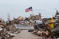 Tornado aftermath can be seen in Moore, Okla., May 28, 2013. An EF-5 tornado ripped through Moore May 20, 2013, leveling schools, houses and businesses. (DoD photo by Tech. Sgt. Roberta A. Thompson, U.S. Air National Guard/Released). Original public domain image from Flickr