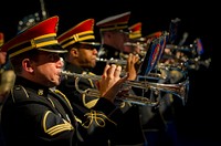 U.S. Soldiers with the U.S. Army Band perform a final musical salute Aug. 16, 2013, during a retirement ceremony in honor of Lt. Gen. Dana K. Chipman, the judge advocate general of the Army, hosted by Chairman of the Joint Chiefs of Staff Army Gen. Martin E. Dempsey in Conmy Hall at Joint Base Myer-Henderson Hall, Va. (DoD photo by Staff Sgt. Sean K. Harp, U.S. Army/Released). Original public domain image from Flickr