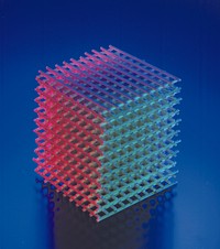 Photonic band-gap crystal. Ames Laboratory developed the first model of a photonic band-gap crystal. Such crystals have the ability to control and filter light similar to the way semiconductor control electricity. Original public domain image from Flickr