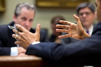 President Barack Obama meets with advisors in the Roosevelt Room of the White House, Dec. 18, 2013.