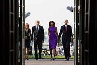 President Barack Obama, First Lady Michelle Obama, Vice President Joe Biden and Dr. Jill Biden walk back to the Diplomatic Reception Room after joining staff on the South Lawn of the White House to observe a moment of silence to mark the 12th anniversary of the 9/11 attacks, Sept. 11, 2013.