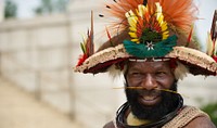 A man in a tribal costume smiles for a photo June 18, 2014, Washington D.C., VA. The memorial which honors Abraham Lincoln, is a tourist location which welcomes more than 5000 visitors a day.