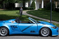 President Barack Obama walks toward a biodiesel car, one of the exhibits at the first White House Maker Faire on the South Lawn of the White House, June 18, 2014.