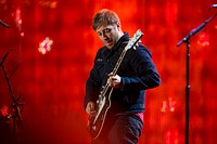 Dan Auerbach, guitarist and vocalist for The Black Keys, plays guitar during The Concert for Valor in Washington, D.C. Nov. 11, 2014. DoD News photo by EJ Hersom. Original public domain image from Flickr