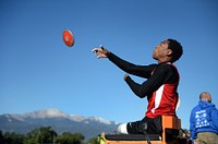 Marine Corps team Sgt. Anthony McDaniel Jr. throws the discus during the 2014 Warrior Games in Colorado Springs, Colo. Sept. 30, 2014. (DoD News photo by EJ Hersom). Original public domain image from Flickr