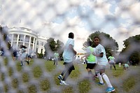 Students from DC Scores participate in a soccer clinic on the South Lawn of the White House following President Barack Obama's event with Sporting Kansas City honoring the team and their victory in the 2013 MLS Cup Championship.