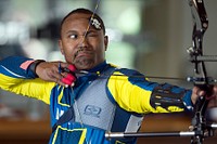 Navy Chief Petty Officer Averill Malone aims an arrow during the Navy’s training camp for the 2015 DoD Warrior Games ends at Ventura County Naval Station Port Hueneme in Oxnard, Ca. May 31, 2015.