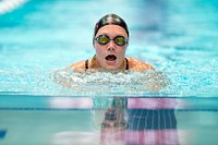 Army Reservist Chasity Kuczer swims breaststroke during the 2015 Department of Defense Warrior Games in Manassas, Va. June 27, 2015. The swimming event portion of the games was held at the Freedom Aquatic and Fitness Center in Manassas. Original public domain image from Flickr