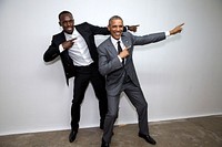 President Barack Obama poses with Usain Bolt, the fastest runner in the world, backstage following a "Young Leaders of the Americas Initiative" town hall at the University of the West Indies in Kingston, Jamaica, April 9, 2015.