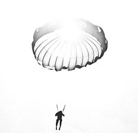 A U.S. Army Reserve paratrooper passes in front of the sun while parachuting during airborne operations at Coyle Drop Zone, Joint Base McGuire-Dix-Lakehurst, N.J., March 12, 2016.