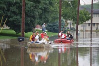 Rescued Flood Victims, Coralville, IARescuing victims in Coralville, IA (photography: Don Becker, USGS). Original public domain image from Flickr
