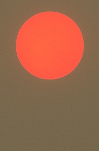 Super zoom large red sun setting. Original public domain image from Flickr