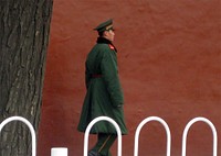 Guards in BeijingBehind the Scenes: Guards patrolling in Beijing, China February 21, 2009. [State Department photo]. Original public domain image from Flickr