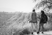 Young backpackers traveling in nature
