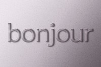 Bonjour French greeting psd emboss typography on paper texture