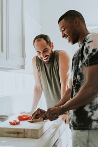 Gay couple cooking in the morning