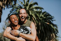 Gay couple hugging in the park