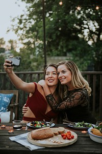 Lesbian couple taking a selfie