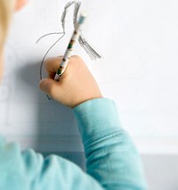 Close up of a child&#39;s hand drawing
