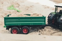 Tractor and a trailer in a sandbox