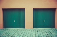 Two green garage doors